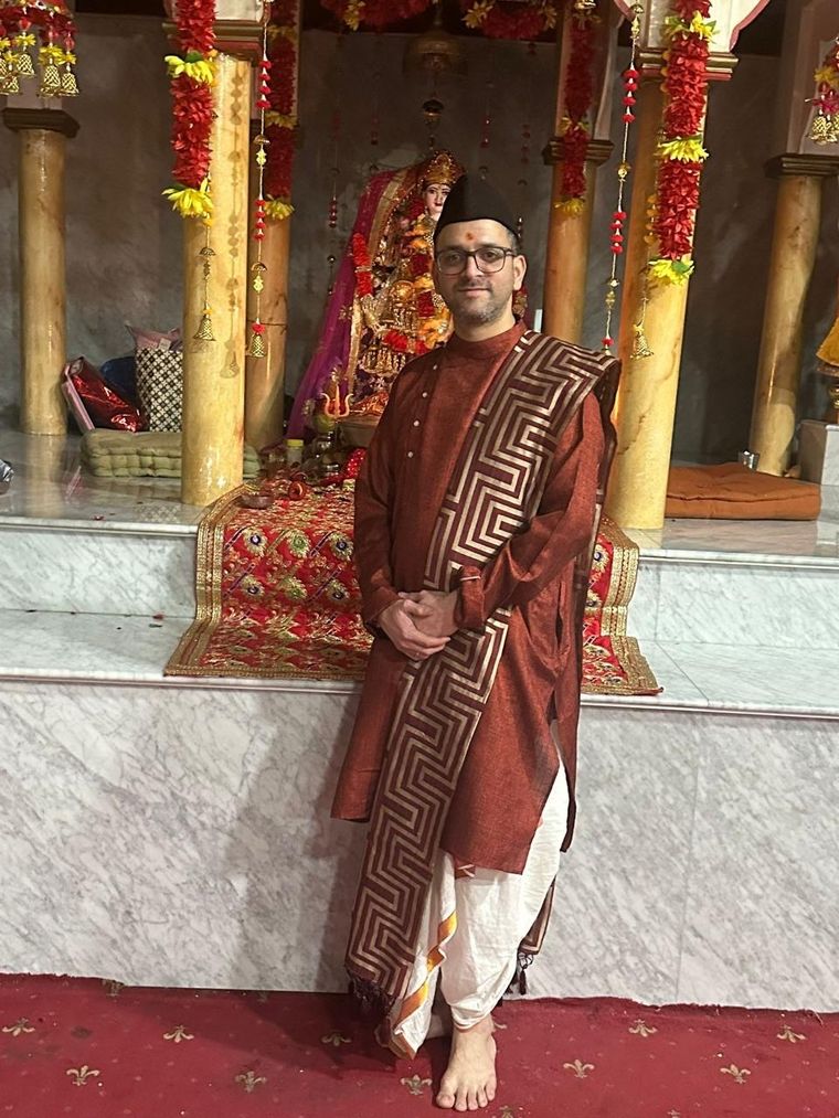 Acharya Deepak Thapliyal, Hindu pandit in UAE, before the temple deities